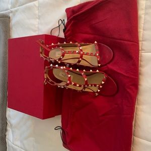 Valentino’s red shoes in great condition.
